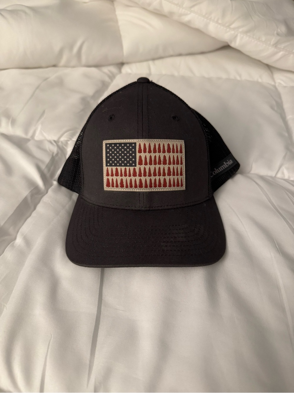 Columbia Black Trucker Hat with Red & White Flag Patch